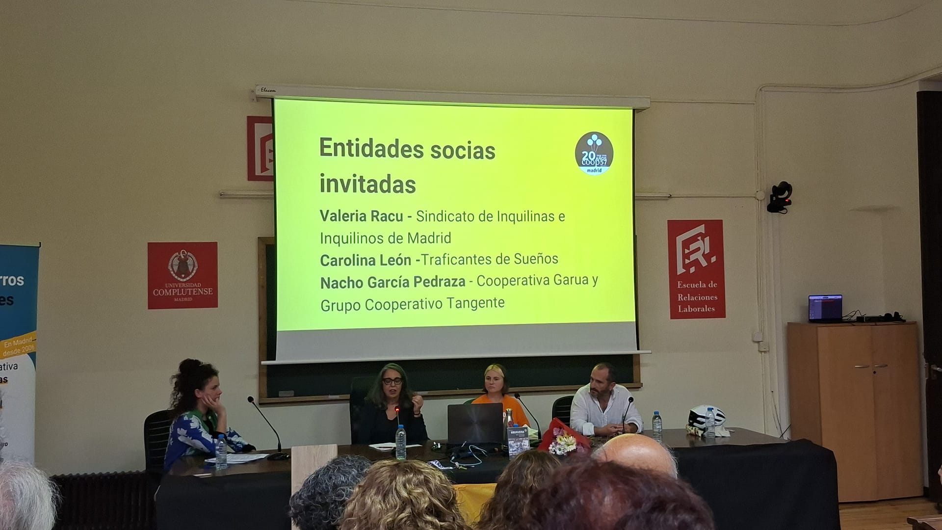 Mesa de entidades socias invitadas en el encuentro del 20.º aniversario de Coop57 Madrid